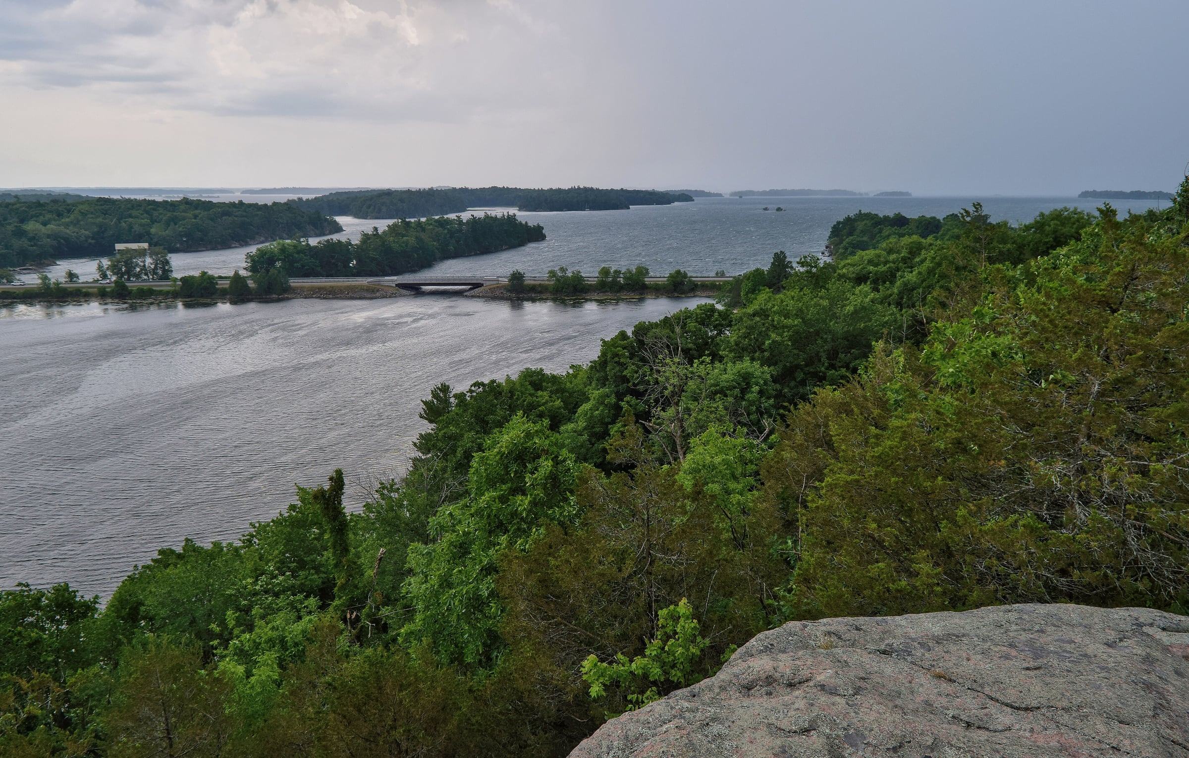 Landon Bay lookout view of the Thousand Islands Parkway causeway and wooded islands in the river